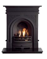 A solid black cast iron fireplace with motif designs, a classic victorian period fireplace. Finished with a granite hearth.

