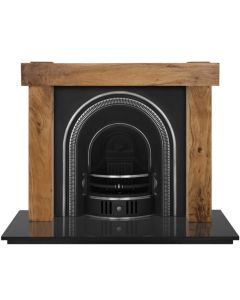 A black and highlighted cast iron fireplace insert, an arched fireplace insert with a decorative fireplace arch, gas fire insert