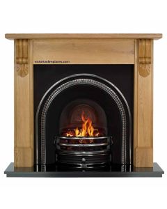 Oak Large Carved 54" Mantel with a Light Hand Waxed Finish, Highlighted Traditions Cast Iron Insert and a Black Granite 54" Hearth.